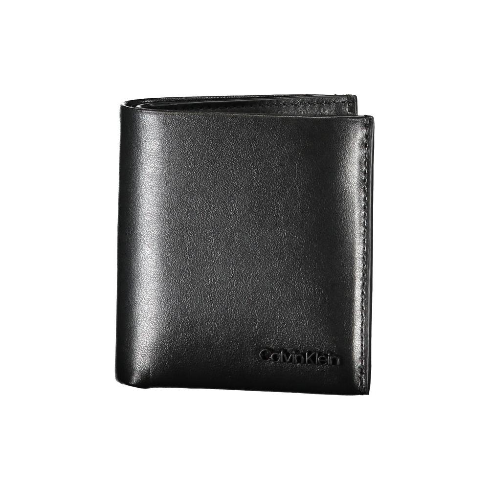 Calvin Klein Sleek Black Leather RFID WalletExperience unparalleled sophistication with the Calvin Klein wallet, crafted for the modern man. This sleek accessory features two roomy compartments, a convenient coin purse, and double card-holder spaces. Enha