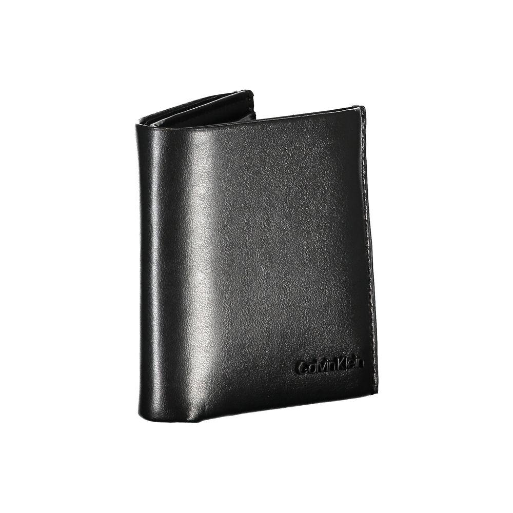 Calvin Klein Sleek Black Leather RFID WalletExperience unparalleled sophistication with the Calvin Klein wallet, crafted for the modern man. This sleek accessory features two roomy compartments, a convenient coin purse, and double card-holder spaces. Enha