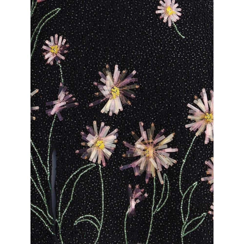 Floral beading detail on Staud Black Nylon Cocktail Dress, showcasing sequins with a floral pattern, perfect for special evenings.