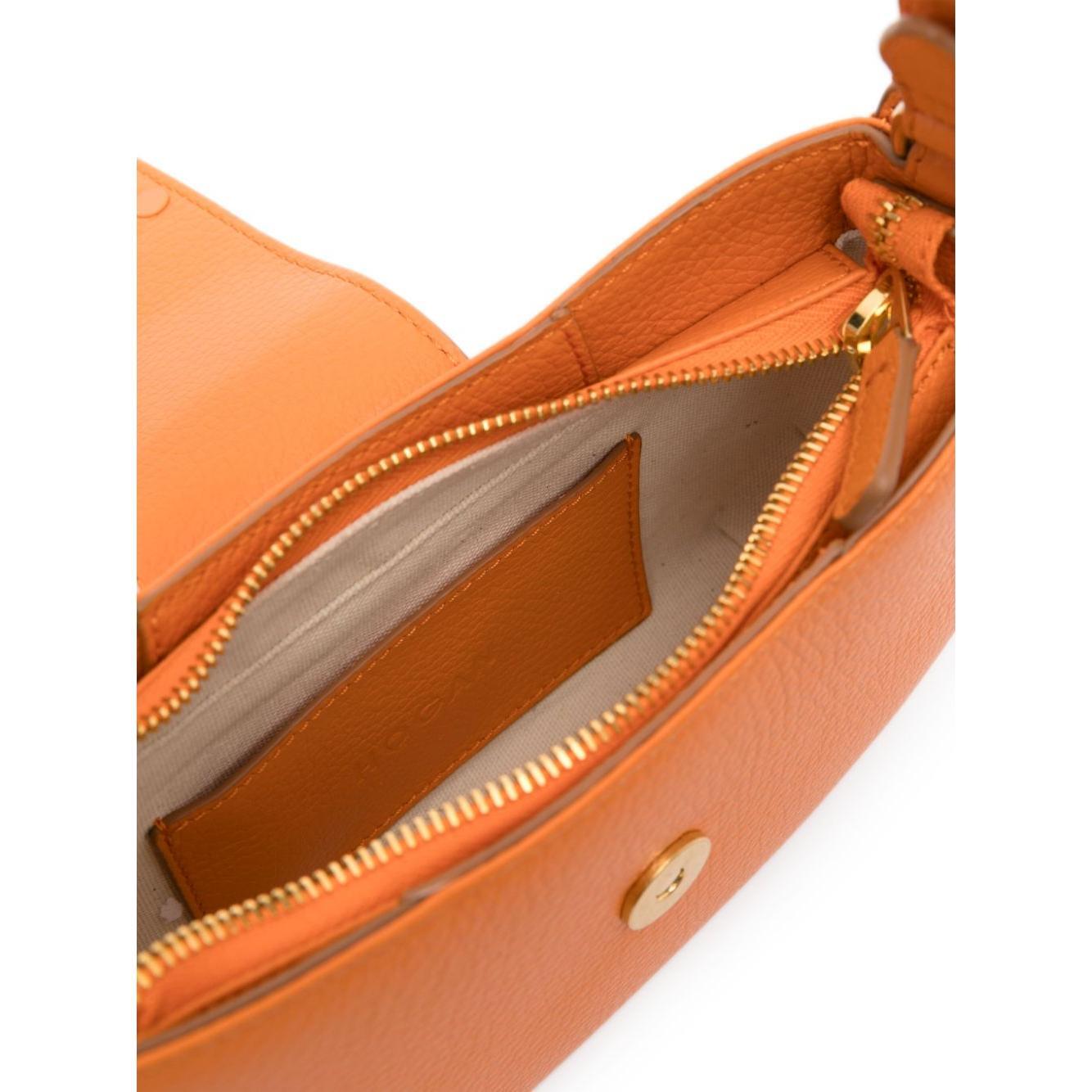 Front view with bag zipped and handles upright.