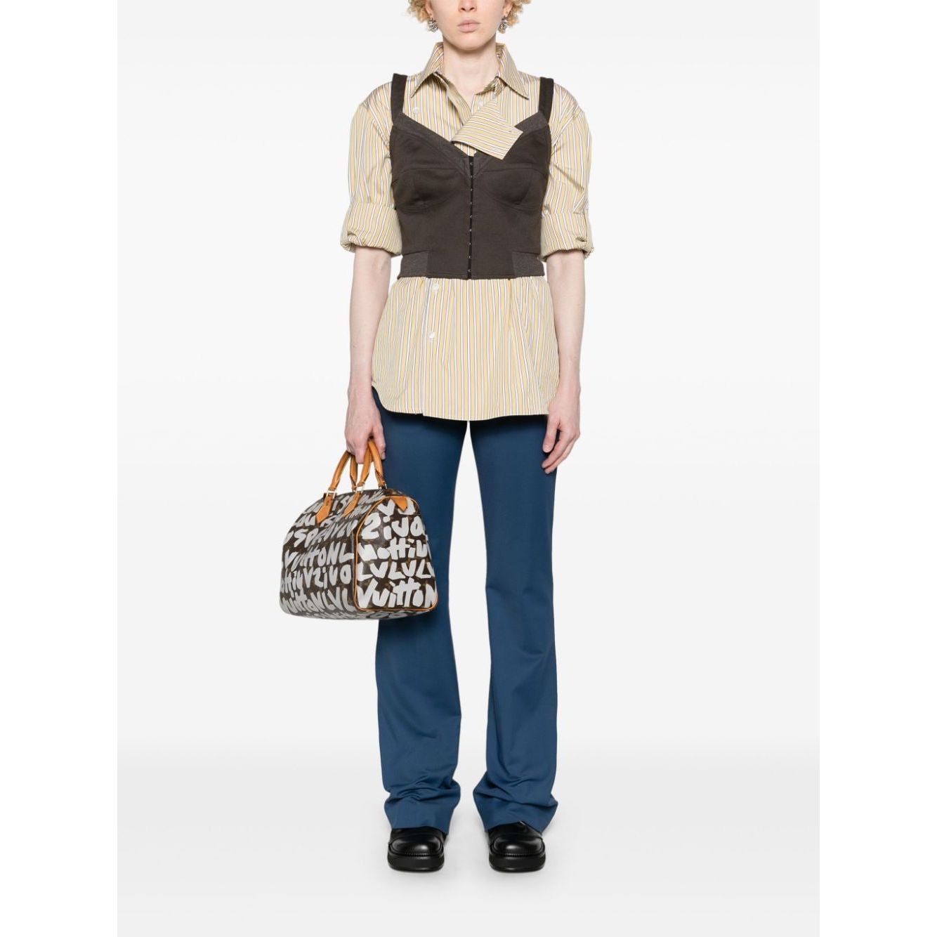 Front view with bag zipped and handles upright.