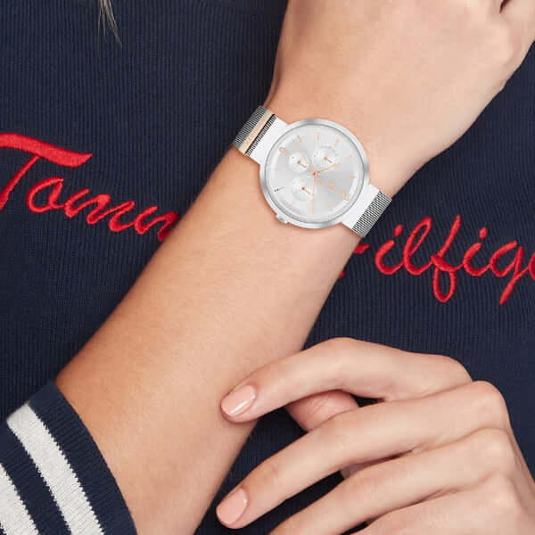 Woman's wrist wearing TOMMY HILFIGER Mod. 1782537 quartz analog watch with mineral dial and silver bracelet.