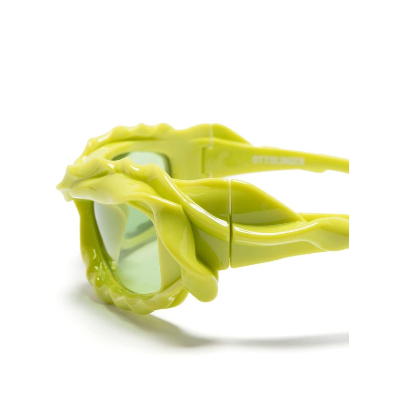 نظارات شمسية من OTTOLINGER باللون الأخضر