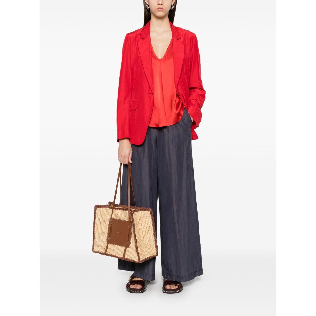 Front view with bag zipped and handles upright.