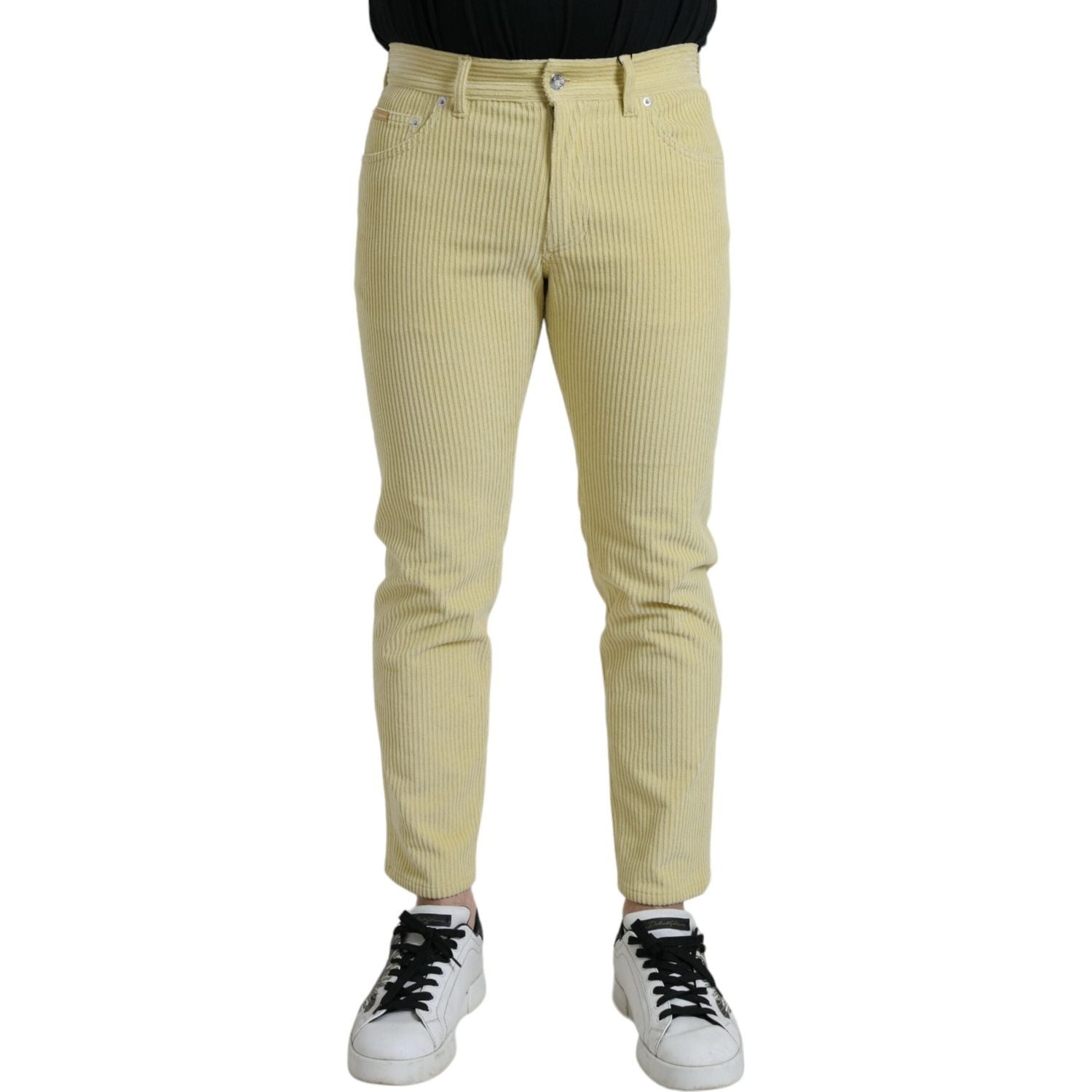 بنطلون جينز ضيق من قماش مخملي أصفر اللون مزين بشعار دولتشي آند غابانا