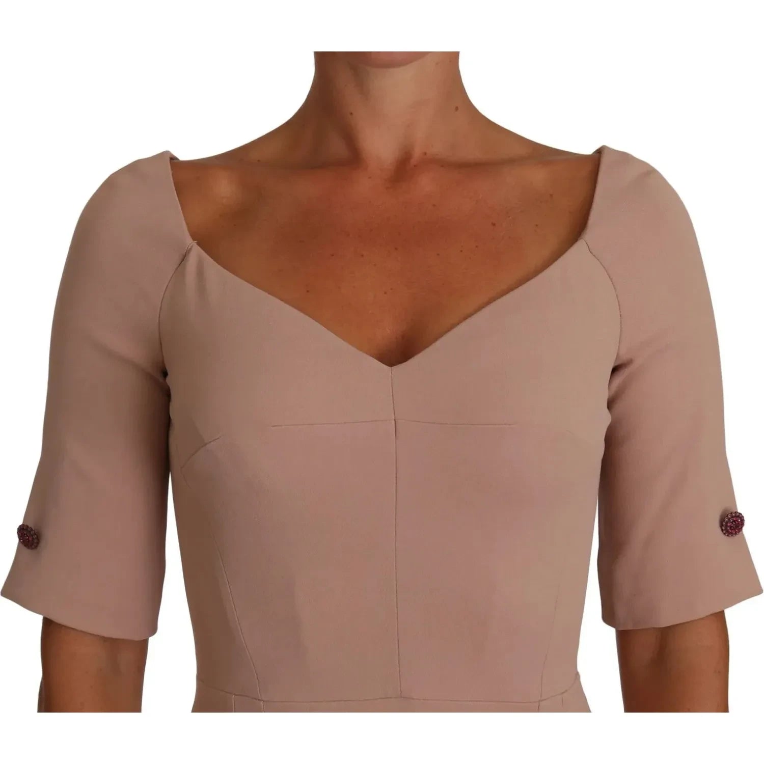 فستان دولتشي آند غابانا متوسط ​​الطول باللون الوردي الفاتح مع أزرار كريستالية