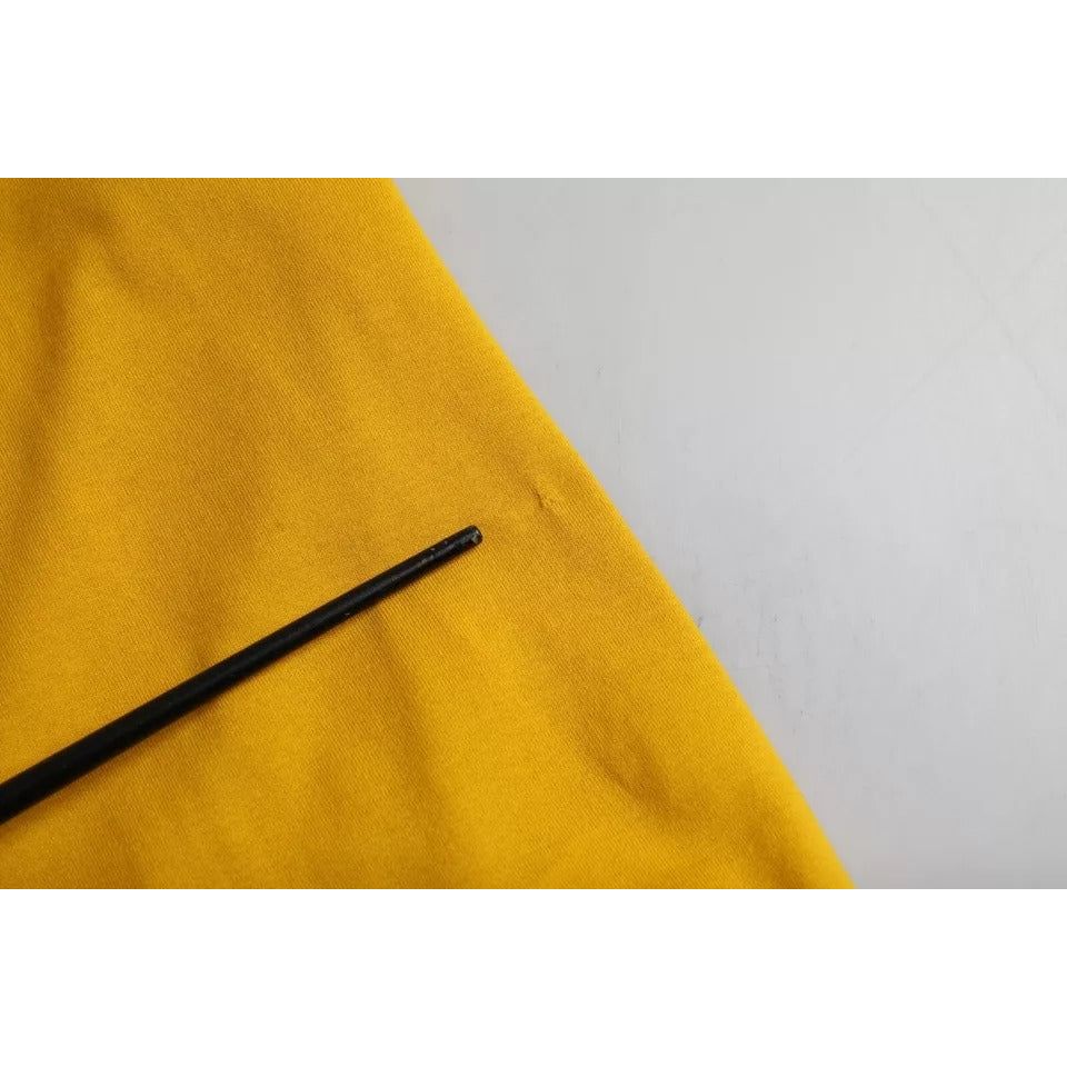 تي شيرت Dolce &amp; Gabbana من القطن بقبة دائرية وشعار باللون الأصفر الداكن