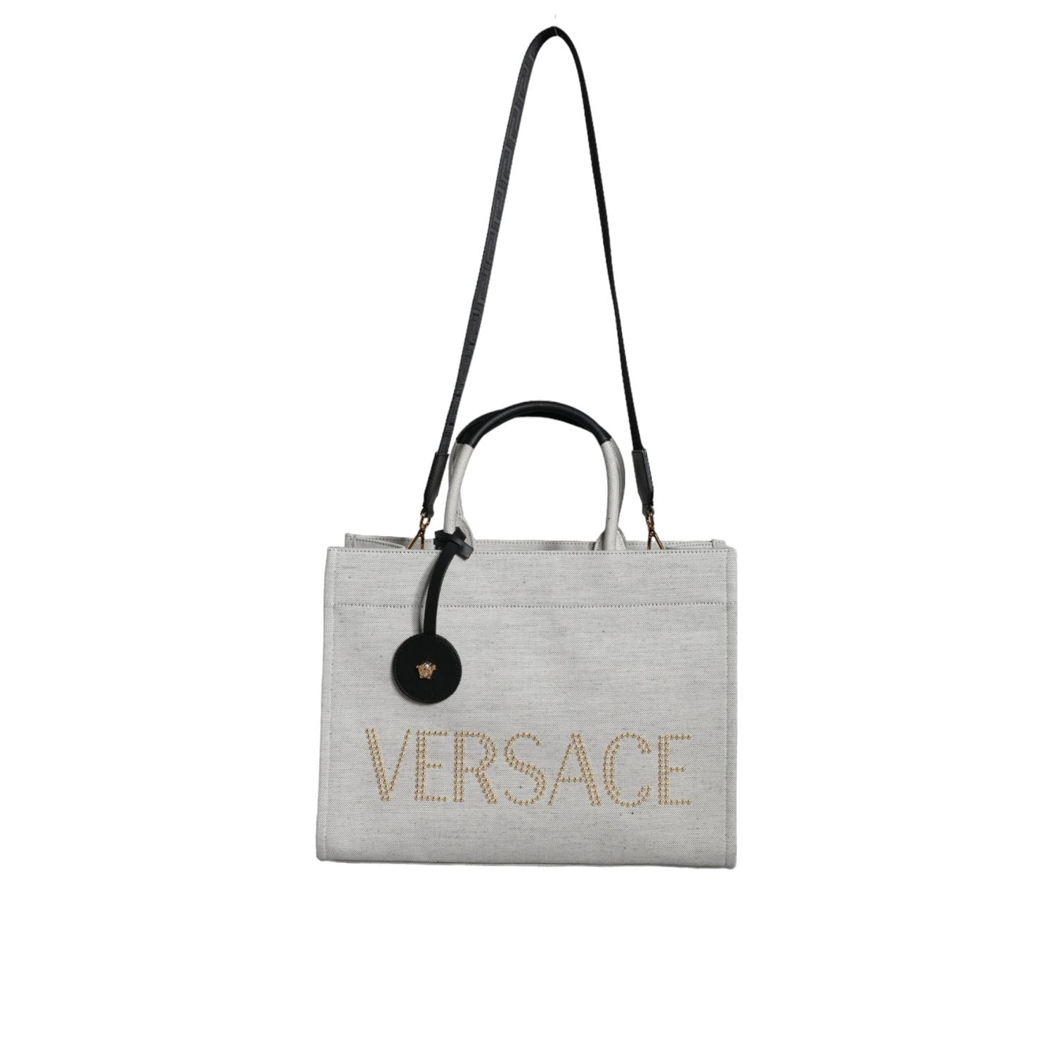 Front view with bag zipped and handles upright.