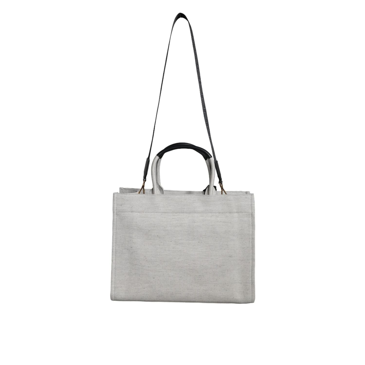 Front view with bag zipped and handles upright.