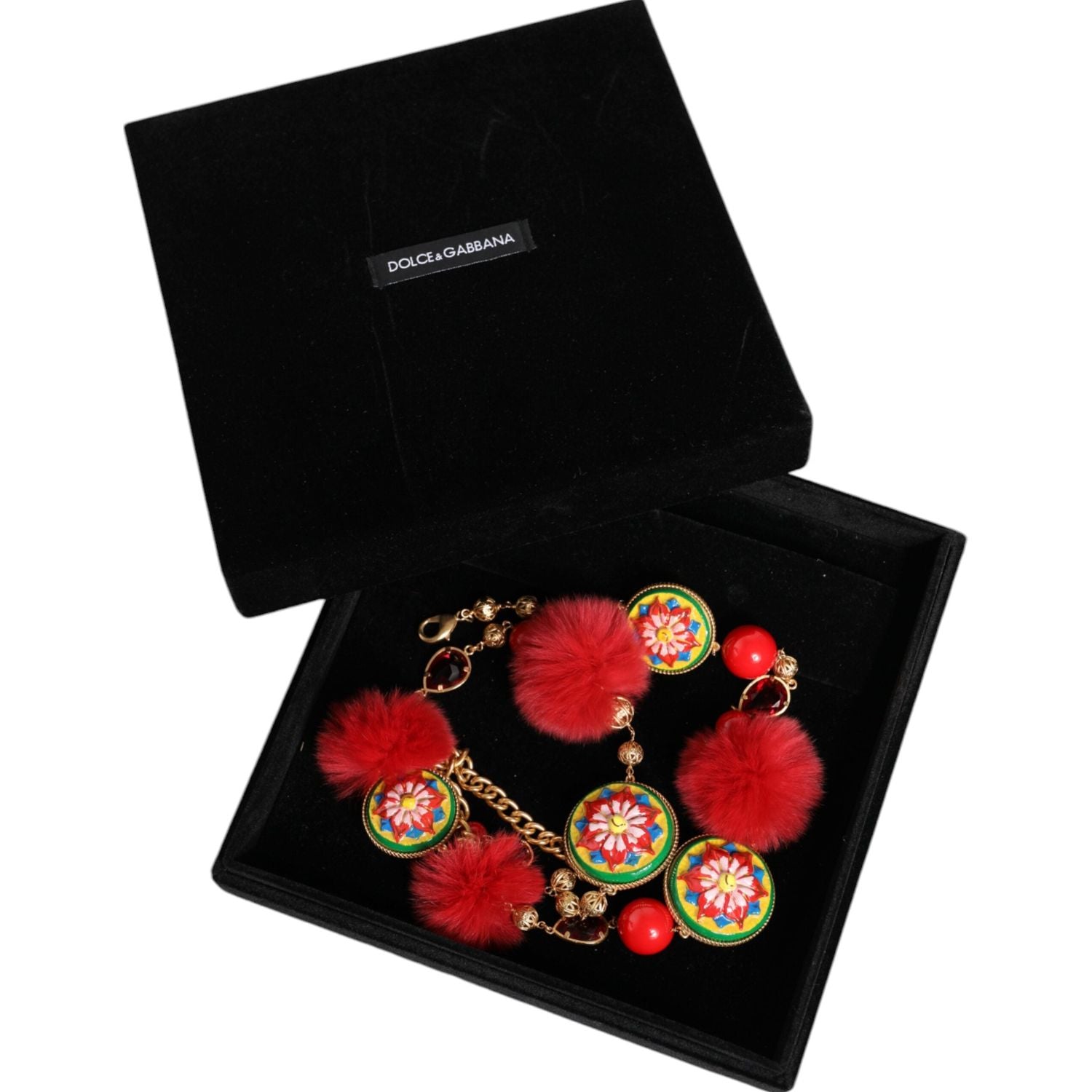 حزام توررو من دولتشي آند غابانا مصنوع من الذهب والنحاس والفراء الأحمر والكريستال