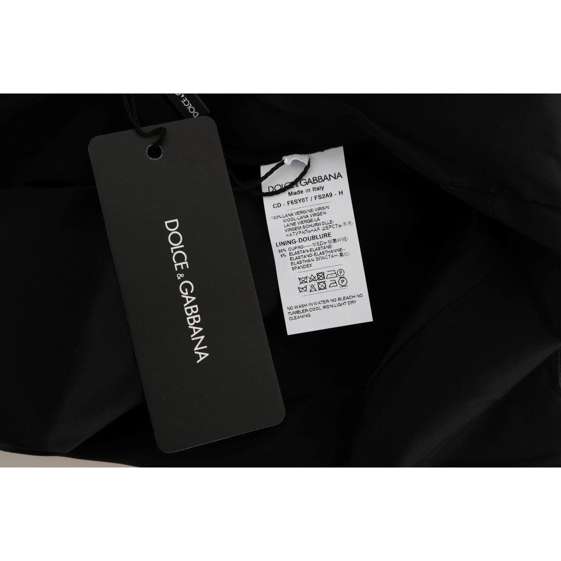 فستان دولتشي آند غابانا الأنيق المصنوع من الصوف بدون أكمام ومنقط بالبولكا