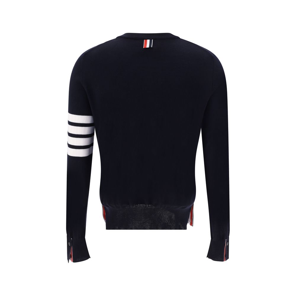 Back view of Thom Browne Gray Fleece Wool Sweatshirt with ribbed crew neck, side buttons, iconic stripes on left arm.