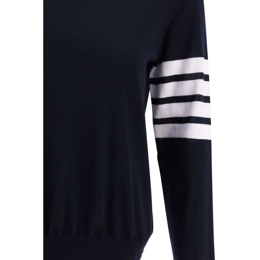 Thom Browne Gray Fleece Wool Sweatshirt with iconic stripes on left arm, ribbed crew neck, hem, and cuffs with side buttons.