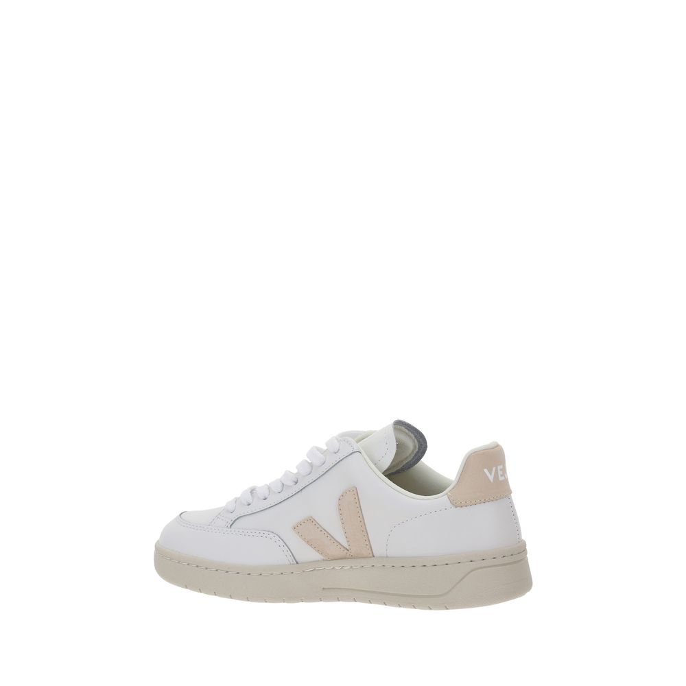 Veja White Rubber Low Top Sneakers, V-12 calfskin design with lace-up closure and iconic brand logo on side and heel, AW25 collection.