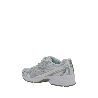 New Balance White Polyurethane Athletic Sneakers with mesh details, lace-up closure, and rubber sole, side view.