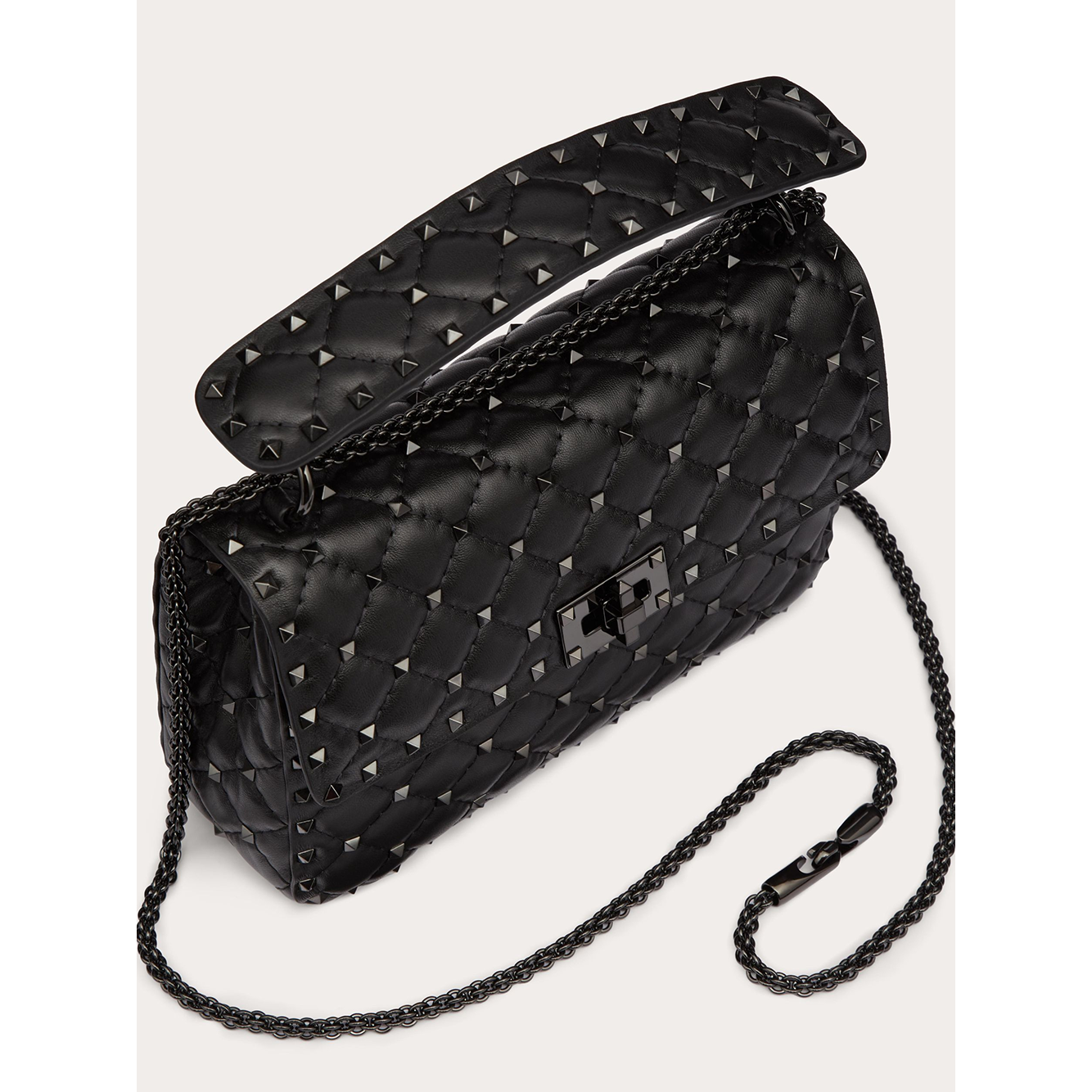Front view with bag zipped and handles upright.
