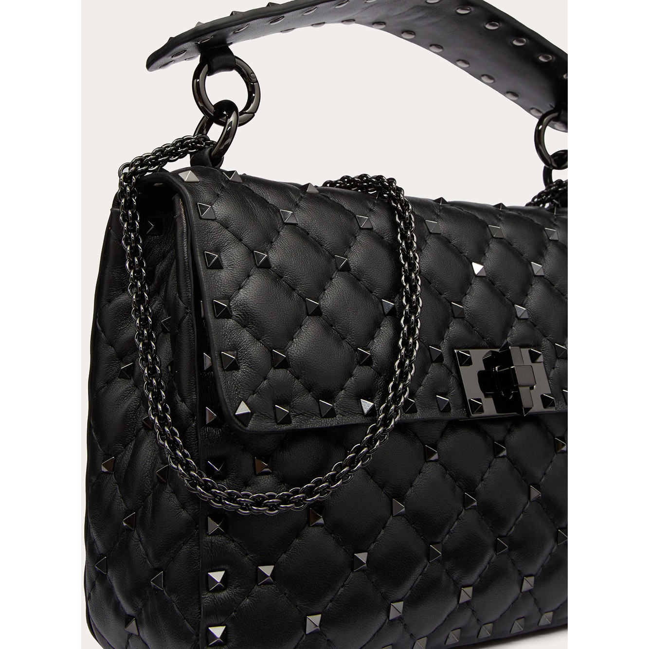 Front view with bag zipped and handles upright.