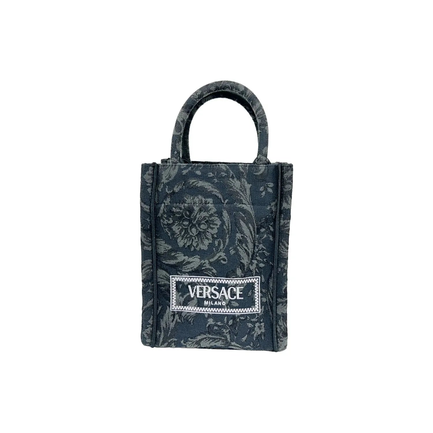 Front view with bag zipped and handles upright.