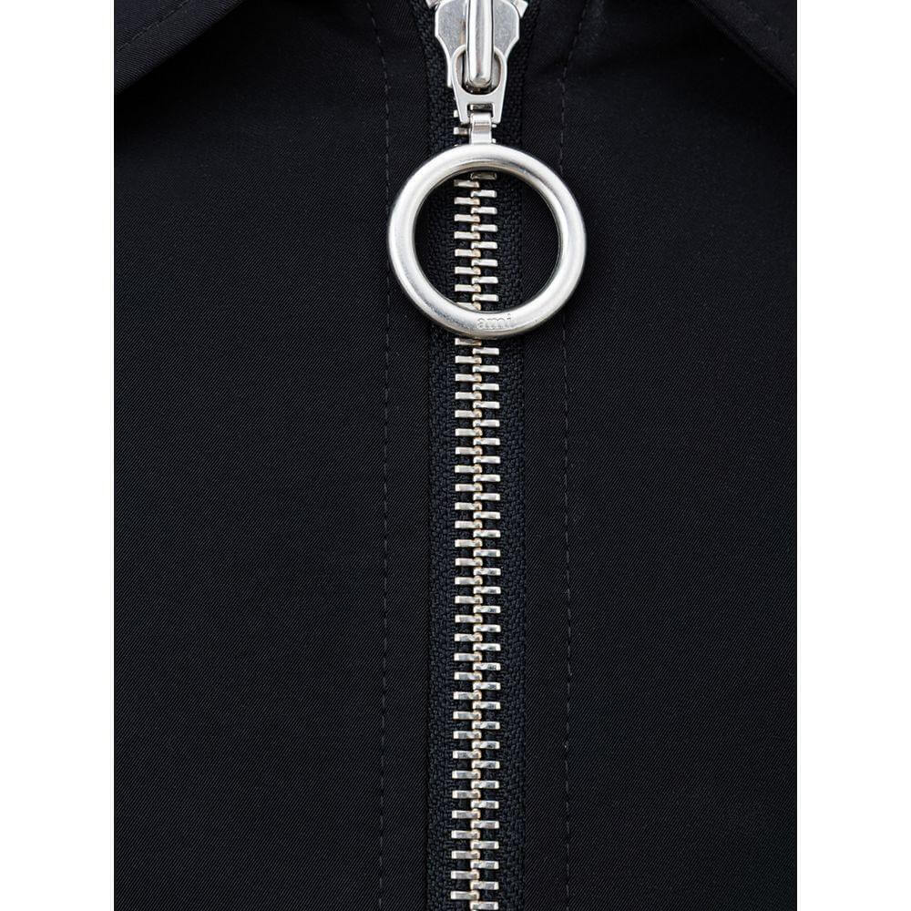 Front view with bag zipped and handles upright.
