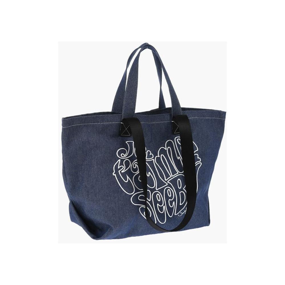 Front view with bag zipped and handles upright.