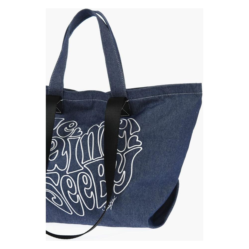 Front view with bag zipped and handles upright.