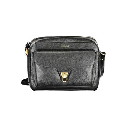 Coccinelle Black Leather Women Handbag with adjustable shoulder strap, showcasing elegant design and functional pockets.