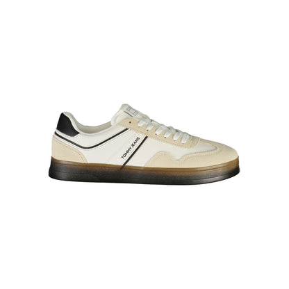 Side view of Tommy Hilfiger White Leather Men Sneaker with black accents, showcasing modern style and iconic logo detail.