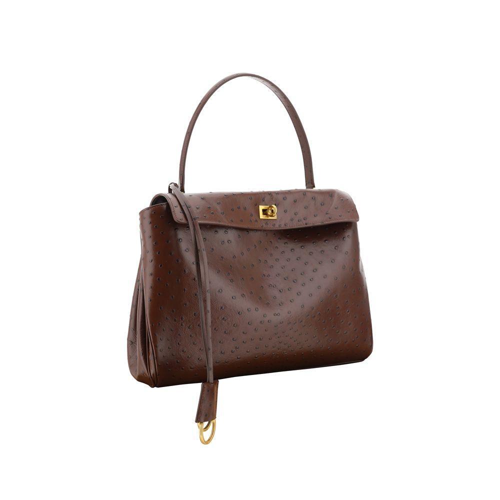 Front view with bag zipped and handles upright.