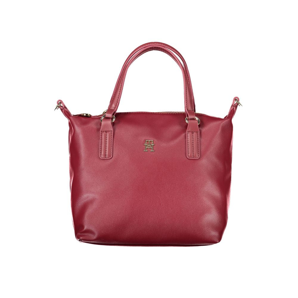 Front view with bag zipped and handles upright.