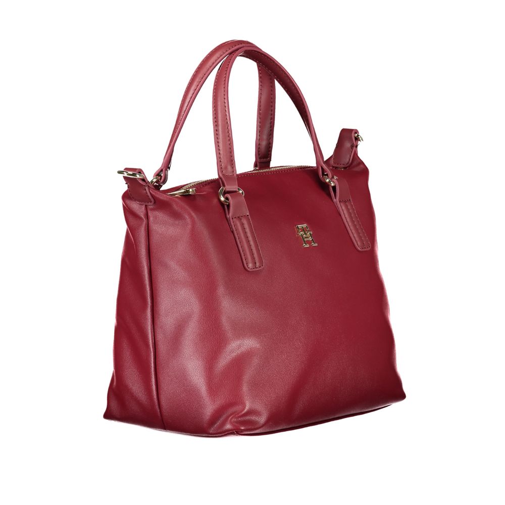 Front view with bag zipped and handles upright.