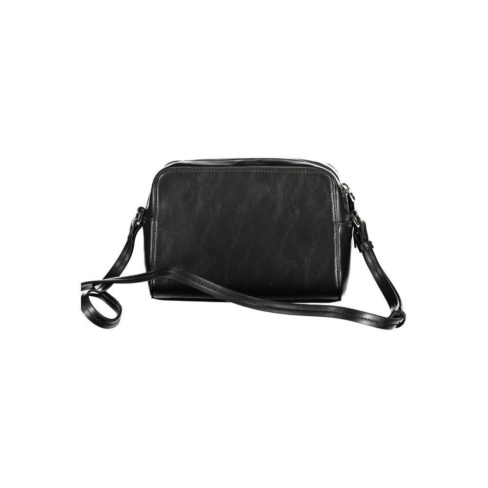 Front view with bag zipped and handles upright.