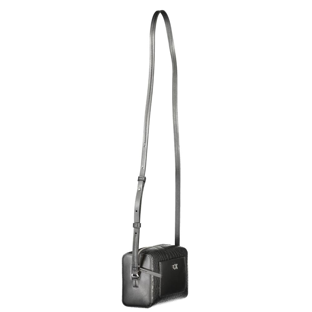Front view with bag zipped and handles upright.