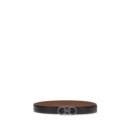 Ferragamo Black Calf Leather Bos Taurus Regular Belt with Gancini buckle in ruthenium finish, reversible and adjustable, elegant fashion accessory.