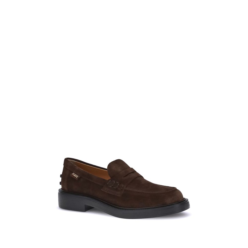 Tod's Brown Rubber Slip-On Loafers featuring suede material, hand-stitched vamp, and embossed rubber sole for timeless elegance and comfort.