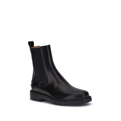 Tod's Black Calf Leather Bos Taurus Chelsea Boots with elastic sides and rubber sole