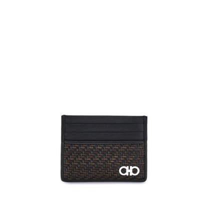 Ferragamo Black Calf Leather Bos Taurus Wallet with palladium-finish Gancini ornament and woven calfskin design for AW25.