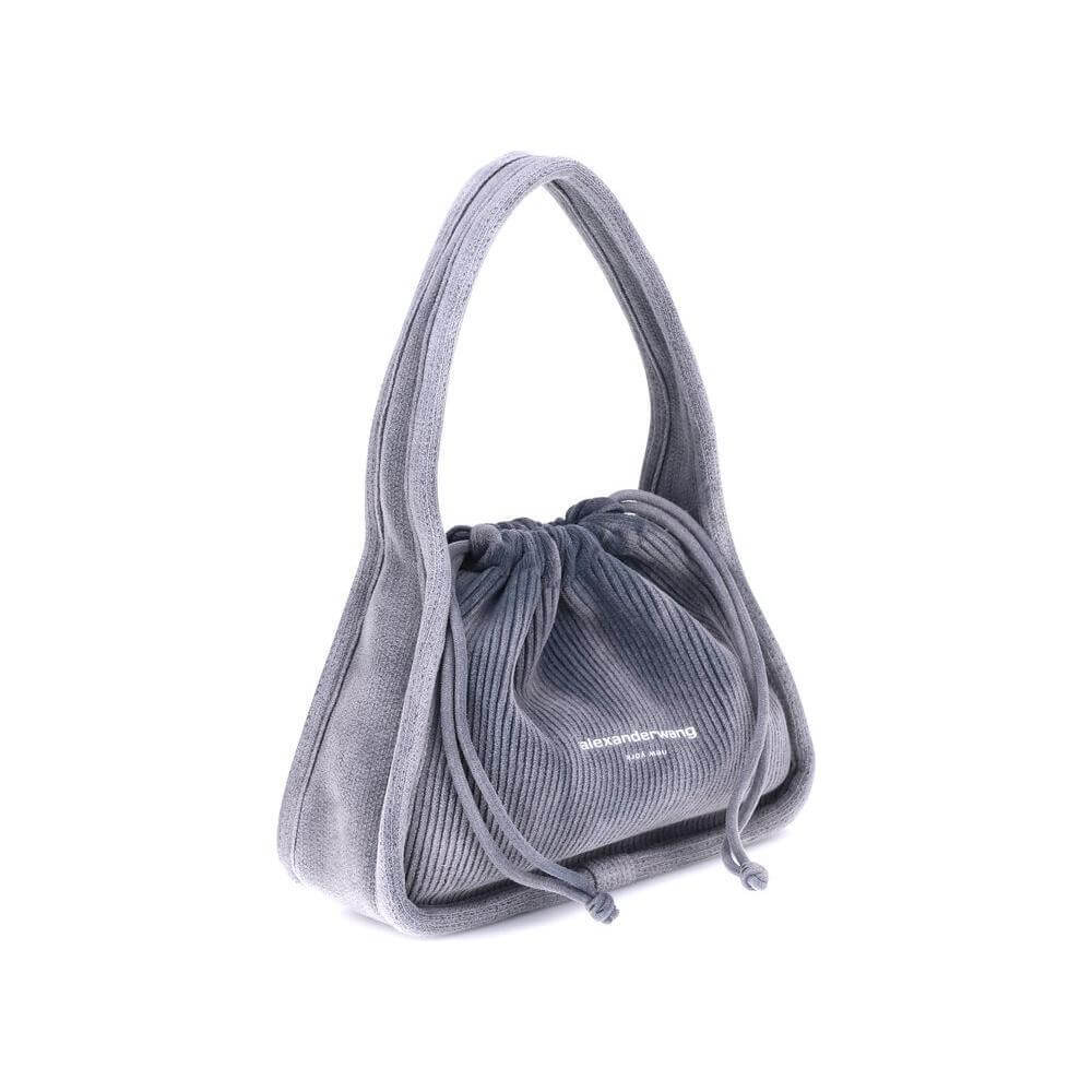 Front view with bag zipped and handles upright.
