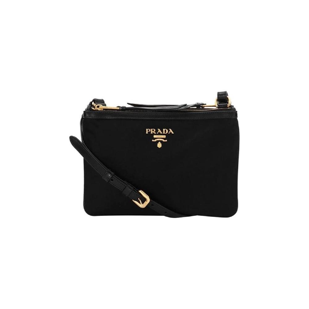 Front view with bag zipped and handles upright.