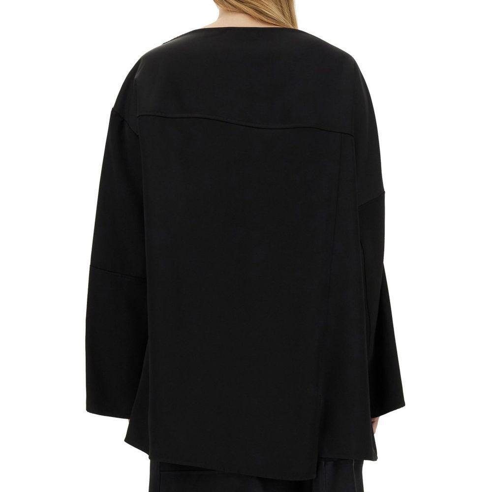 Front view with bag zipped and handles upright.