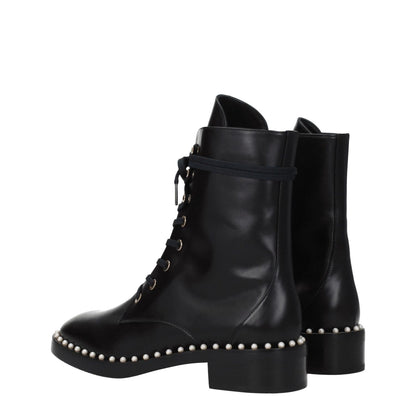 Stuart Weitzman Black Leather Ankle Boots with beaded detail, lace-up closure, 3.5 cm mid heels, punk rock style, rubber sole.