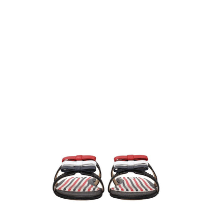 Thom Browne Black Leather Slippers with stripe pattern, front detail, open toe, and flat heel, perfect for casual style.