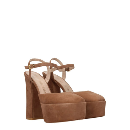 Stuart Weitzman Beige Leather Platform Sandals with high heel and buckle closure, featuring suede material and round toe design.