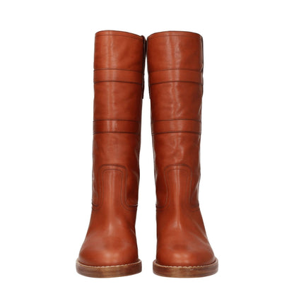 Celine Brown Leather Boots with vintage effect and mid heels. These casual boots feature a side logo and cognac color accents.