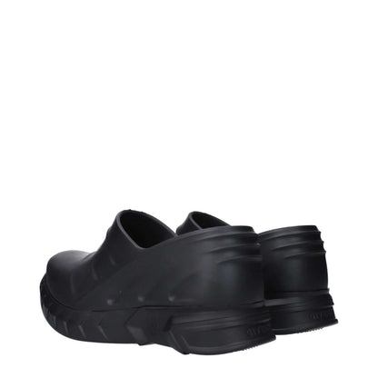 Givenchy Black Cotton Slippers with side and back logo, rubber sole, wedge heel, and round toe design.
