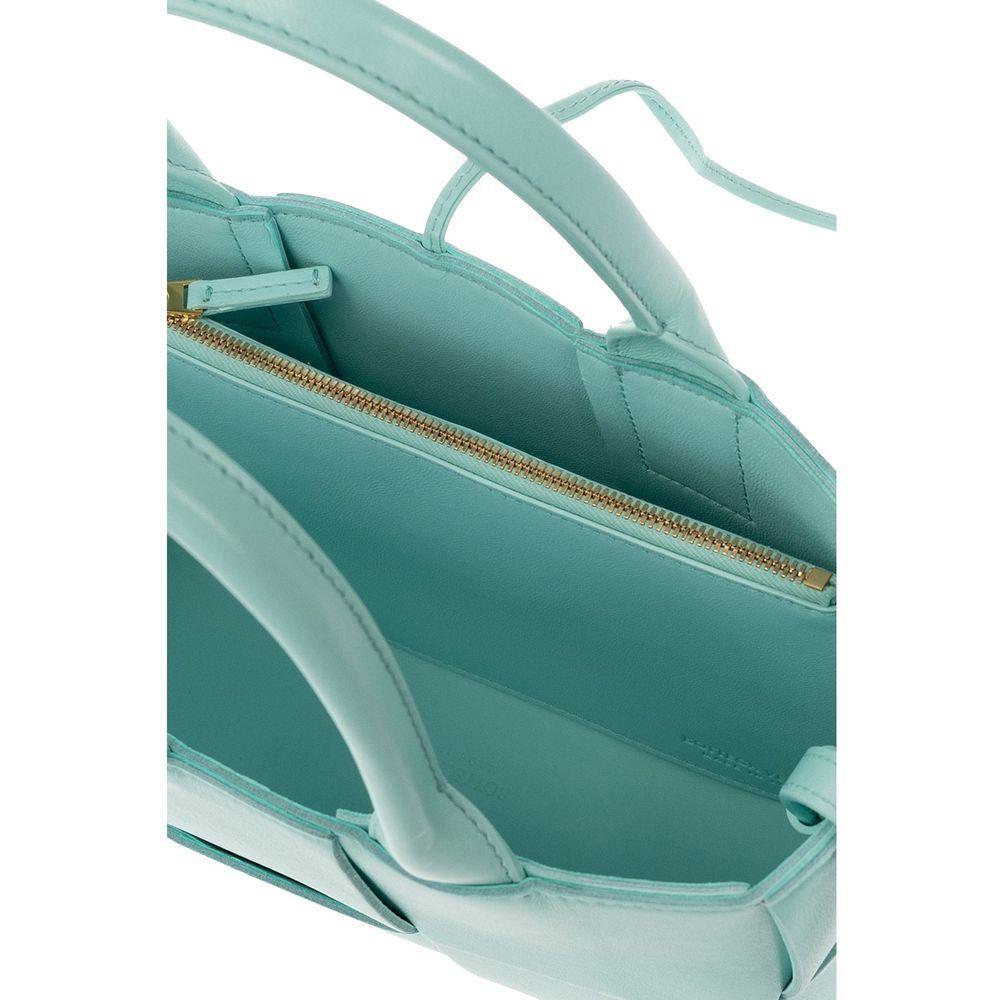 Front view with bag zipped and handles upright.