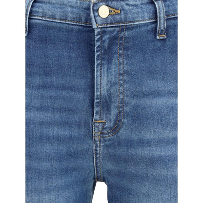 Close-up of 7FOR Blue Cotton Flared Jeans showcasing front zipper, button closure, and waist loops for a modern silhouette.