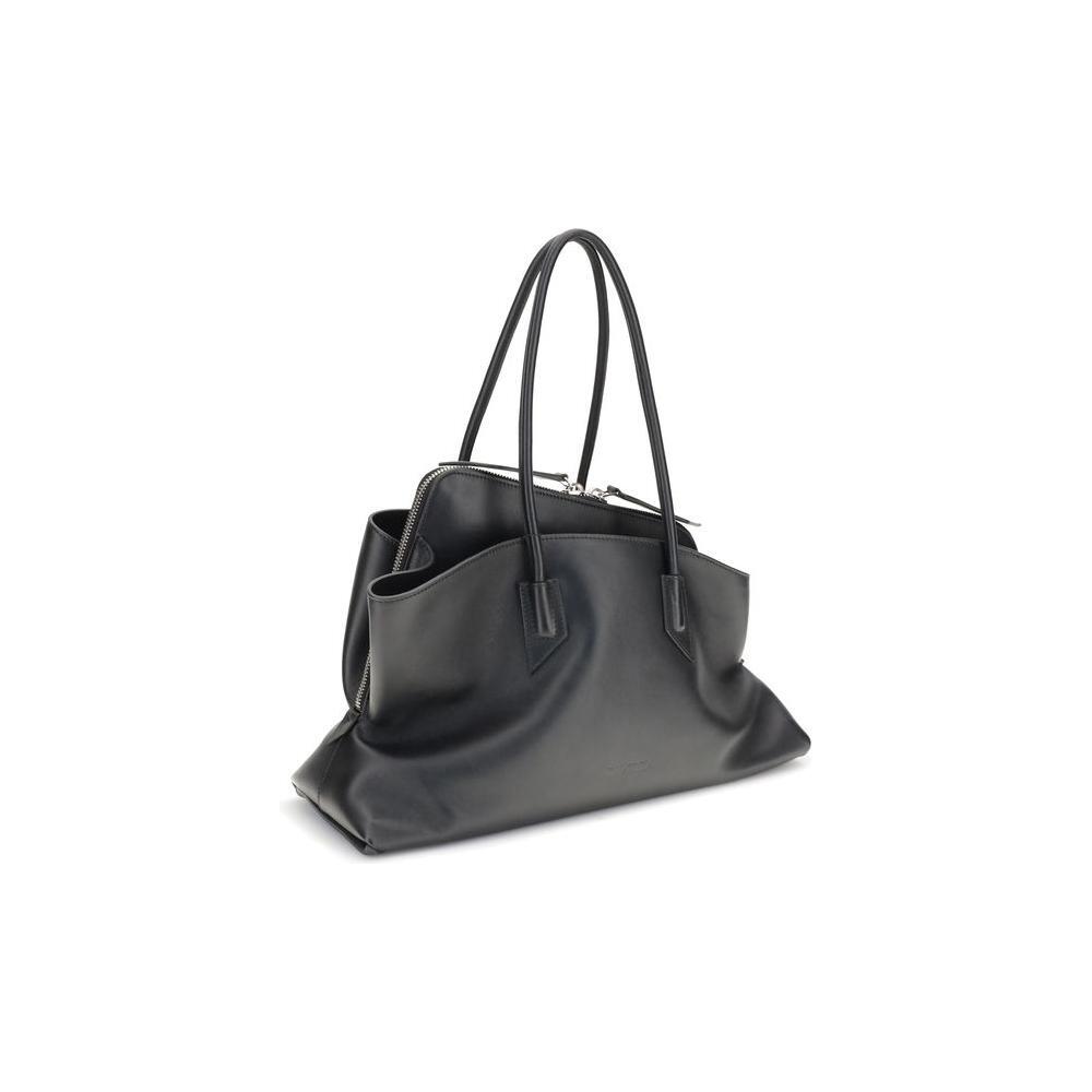 Front view with bag zipped and handles upright.