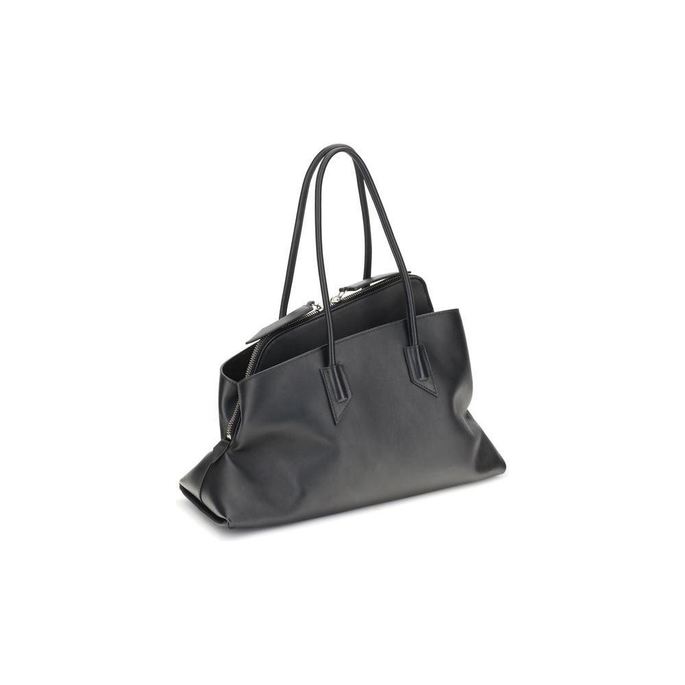 Front view with bag zipped and handles upright.