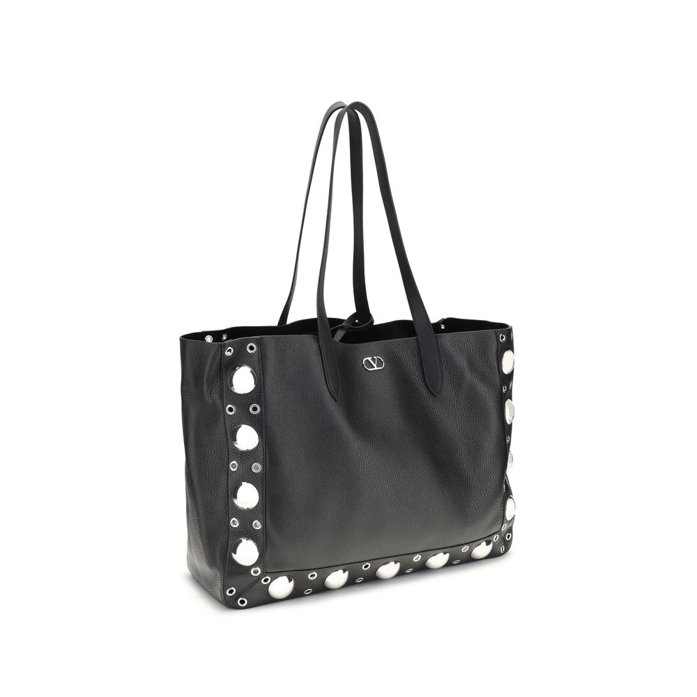 Valentino Garavani Black Calf Leather Bos Taurus Shoulder Bag with ball studs and rivets, showing elegance and modern style.