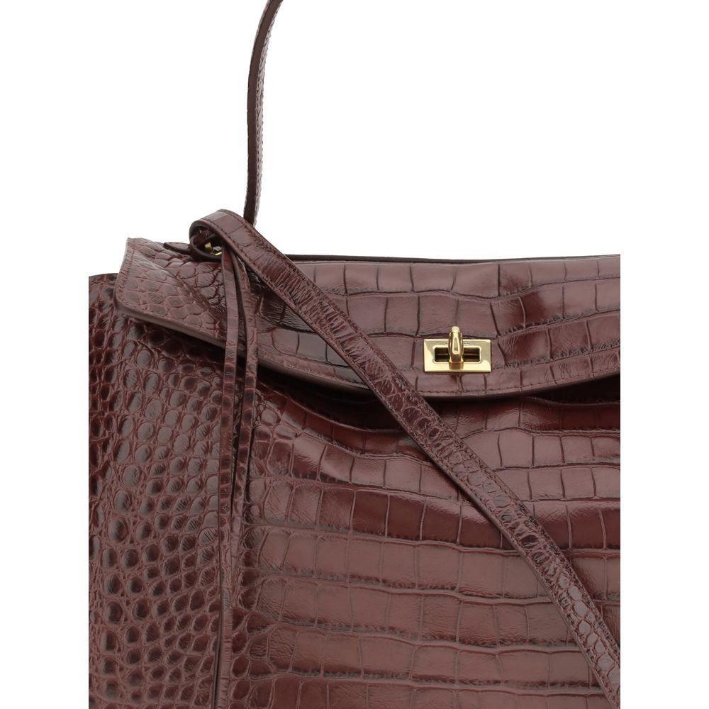 Front view with bag zipped and handles upright.